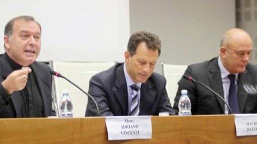 
 Mons. Adriano Vincenzi, Maurizio Battista e il presidente Paolo Bedoni