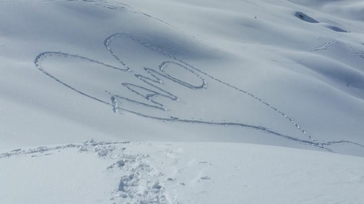 La scritta sulla neve del Carega